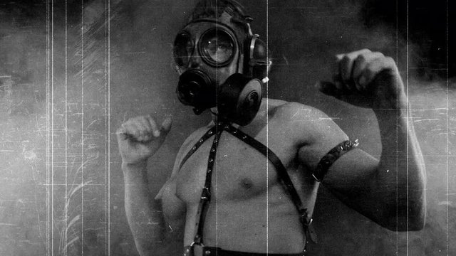 male dnacing with gas mask