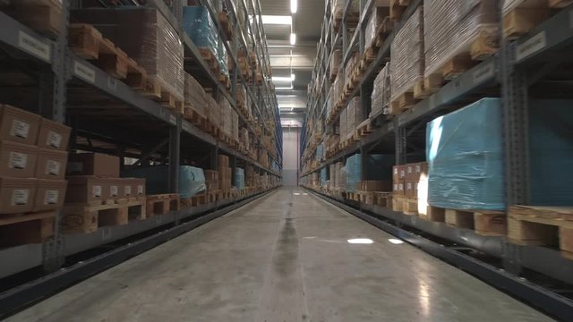 Flying through the big factory warehouse.