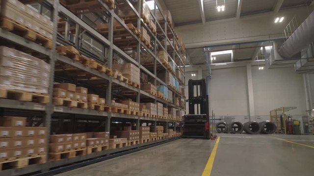 Flying through the big factory warehouse.