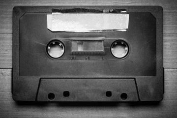 Vintage Cassette tape on a wood background with copy space