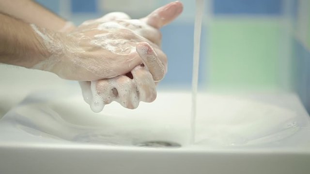 Man Washing Hands in slow motion