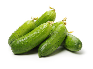 Green cucumber on the white background
