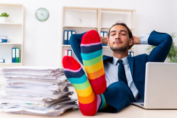 Young male businessman working in the office