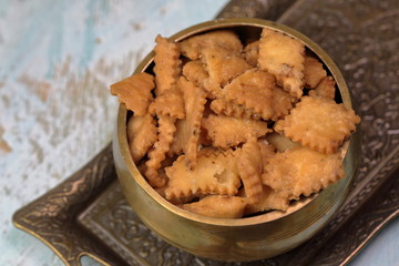 Namakpara (Khurma, Nimki, Mathri) which is a crispy, crunchy and savory strips in a bowl.