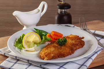 Fish breaded with fresh lemon