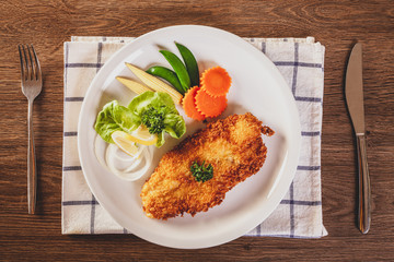 Fish breaded with fresh lemon