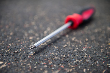 Red and black phillips screwdriver