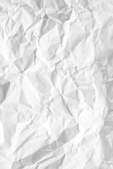 white and gray crumpled paper texture background. crush paper so that it becomes creased and wrinkled.