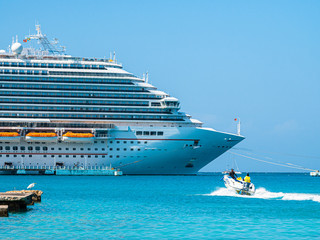 Cruise ship on the port side of Jamaica at sun weather