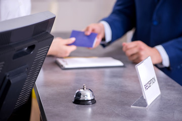 Fototapeta premium Hotel reception bell at the counter