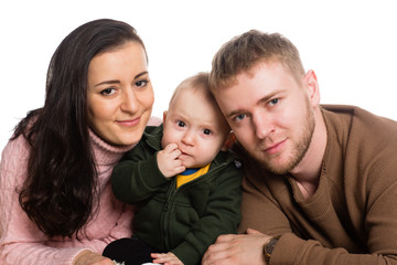 Fototapeta premium Portrait young family father mother and little boy