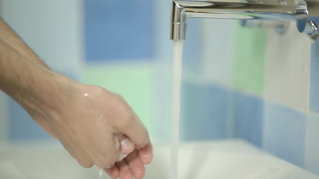 Closeup of Won Washing Hands in slow motion