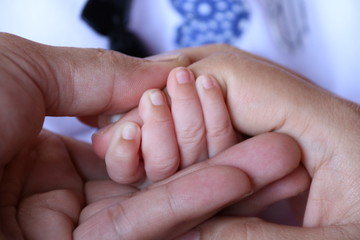 hands of mother and baby