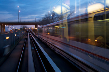 Obraz na płótnie Canvas Photograph of blur motion of the train in the evening