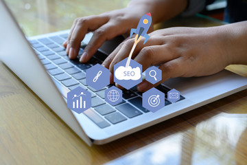 SEO Search Engine Optimization concept with laptop computer. ranking traffic on website, internet...
