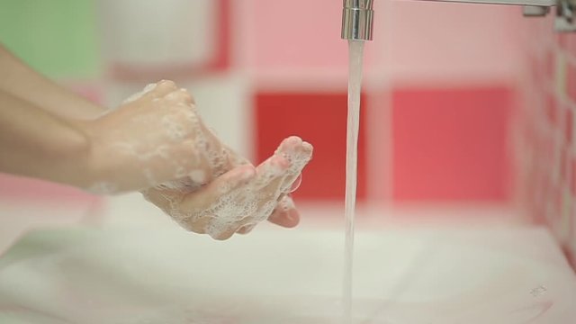 Closeup Woman washing hands