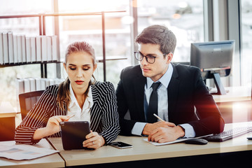 Business people working in a small office