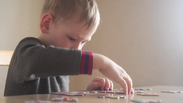 Child, playing puzzles at home
