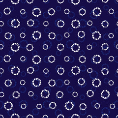 Vector blue shibori simple circle polkadot seamless pattern. Suitable for textile, gift wrap and wallpaper.