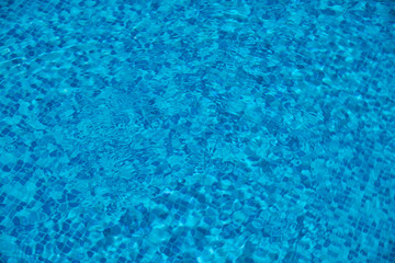 The blue tiled bottom background, of swimming pool. Cyprus