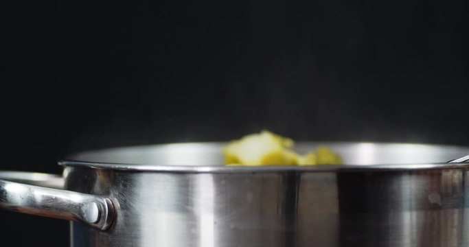 Open a hot pot of ready broccoli. To let off steam from the pan.