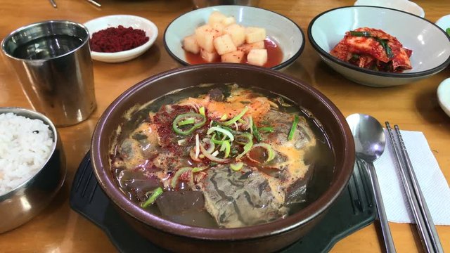Korean traditional food 'Seonji hangover soup(Ox Blood Hangover Soup)' and rice with 'kimchi'