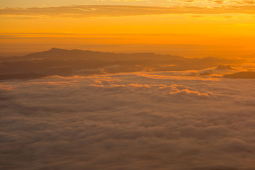 Fototapeta na wymiar Mountain top view of sunrise landscape in the rainforest, Thailand.