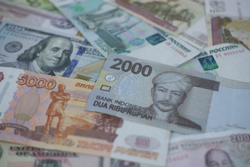 A collection of international currencies. Dollar bill, Bank note. Money Exchange Finance Business concept.
