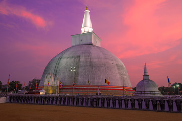 Ruwanweli Maha Seya Dagoba  close-up on a sunset background. Anuradhapura, Sri Lanka