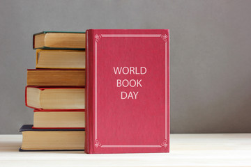 world book day. stack of books on the table.