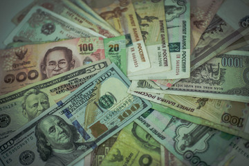 A collection of  international currencies. Dollar bill, Bank note. Money Exchange Finance Business concept.