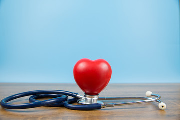 Heart and stethoscope concepts a physical examination and health insurance.
