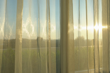 sun light morning through white curtain on window