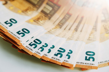 Obraz premium Layout of money on a white background Flatley. Paper money account in Europe. 50 Euro banknotes.