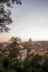 Obraz premium Evening view of the Roman rooftops from from the public park Pincian Hill, Villa Borghese gardens, Rome, Italy