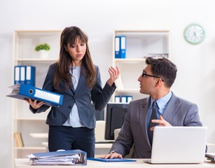 Man and woman working in the office