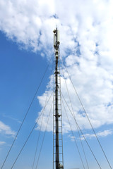 Telecommunication tower. Digital wireless communication system. Basic station mobile phone. 5G of the smart antenna of a basic radiotelephone.