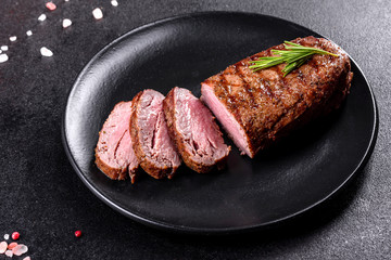 Ribeye steak with potatoes, onions and cherry tomatoes