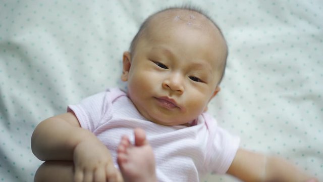 Close up of Asian baby newborn