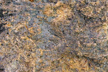 yellow stone or brown rock and wave or rough texture gray and wall or floor on mountain cliff for background or wallpaper