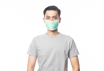 Young Asian Man wearing hygienic mask to prevent infection, 2019-nCoV or coronavirus. Airborne respiratory illness such as pm 2.5 fighting and flu. Studio shot isolated on white background.