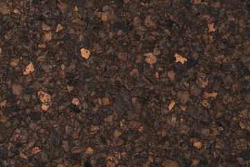 Texture of dark cork with oil finish