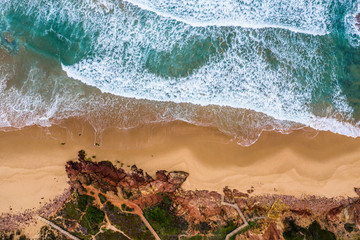 Algarve, Portugal. Waves, Rocks, Beach. Background. Aerial from above