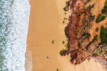 Algarve, Portugal. Waves, Rocks, Beach. Background. Aerial from above