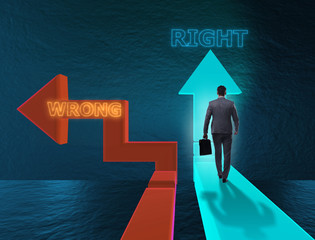 Businessman in difficult choice concept