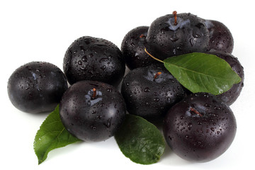 Plums on leaves