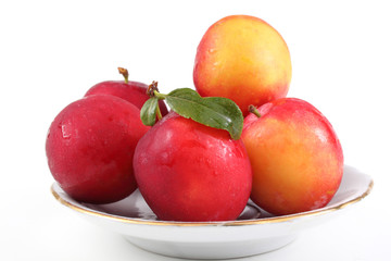 Plums on dish