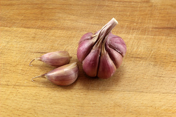 Garlic and cloves on board