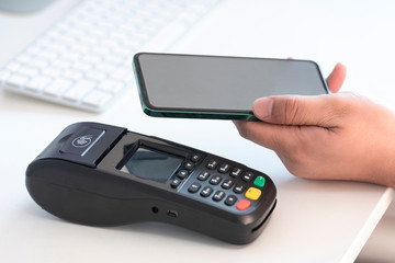 Obraz premium Cell phones and POS machines in the Office