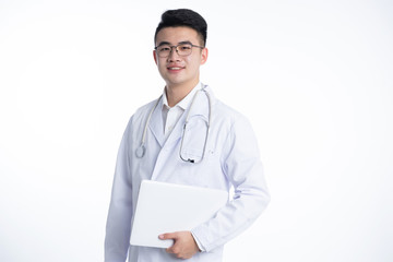 A young Asian doctor is using a device